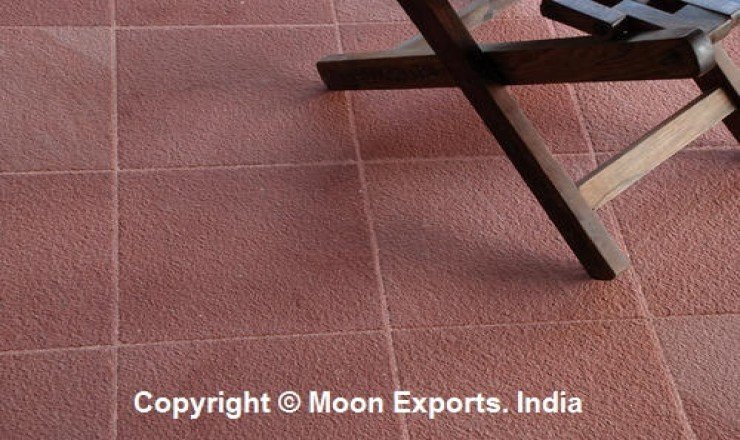Flooring with red honed sandstone