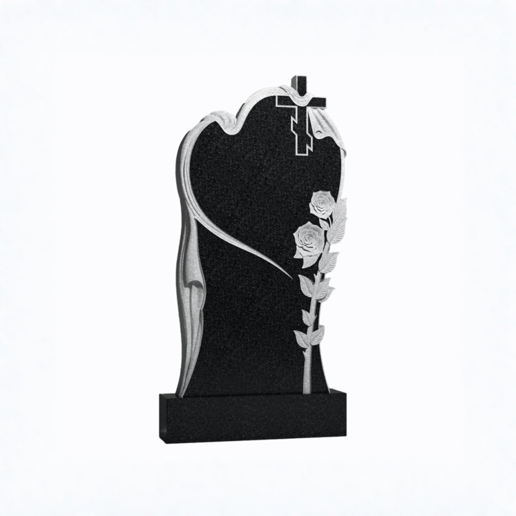 High-polished black granite upright headstone featuring a frosted hand-carved Orthodox cross, draped edge, and a 3D rose vine, set on a solid black granite base