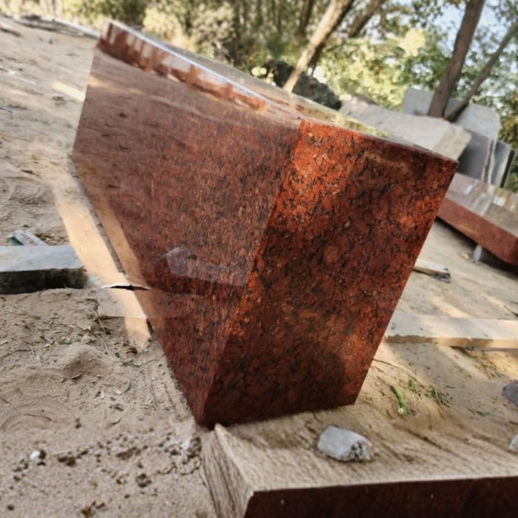 A thick, solid rectangular block of highly polished Imperial Red Indian granite, designed to be used as a sturdy and elegant monument base